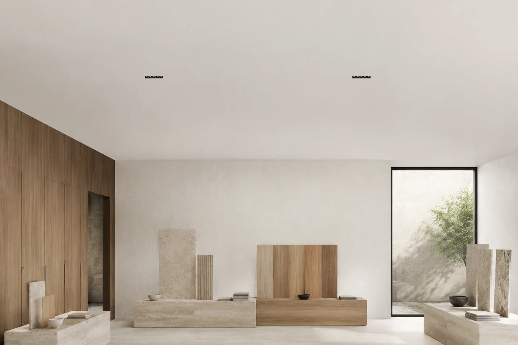 Blade linear downlights integrated into a refined retail ceiling
