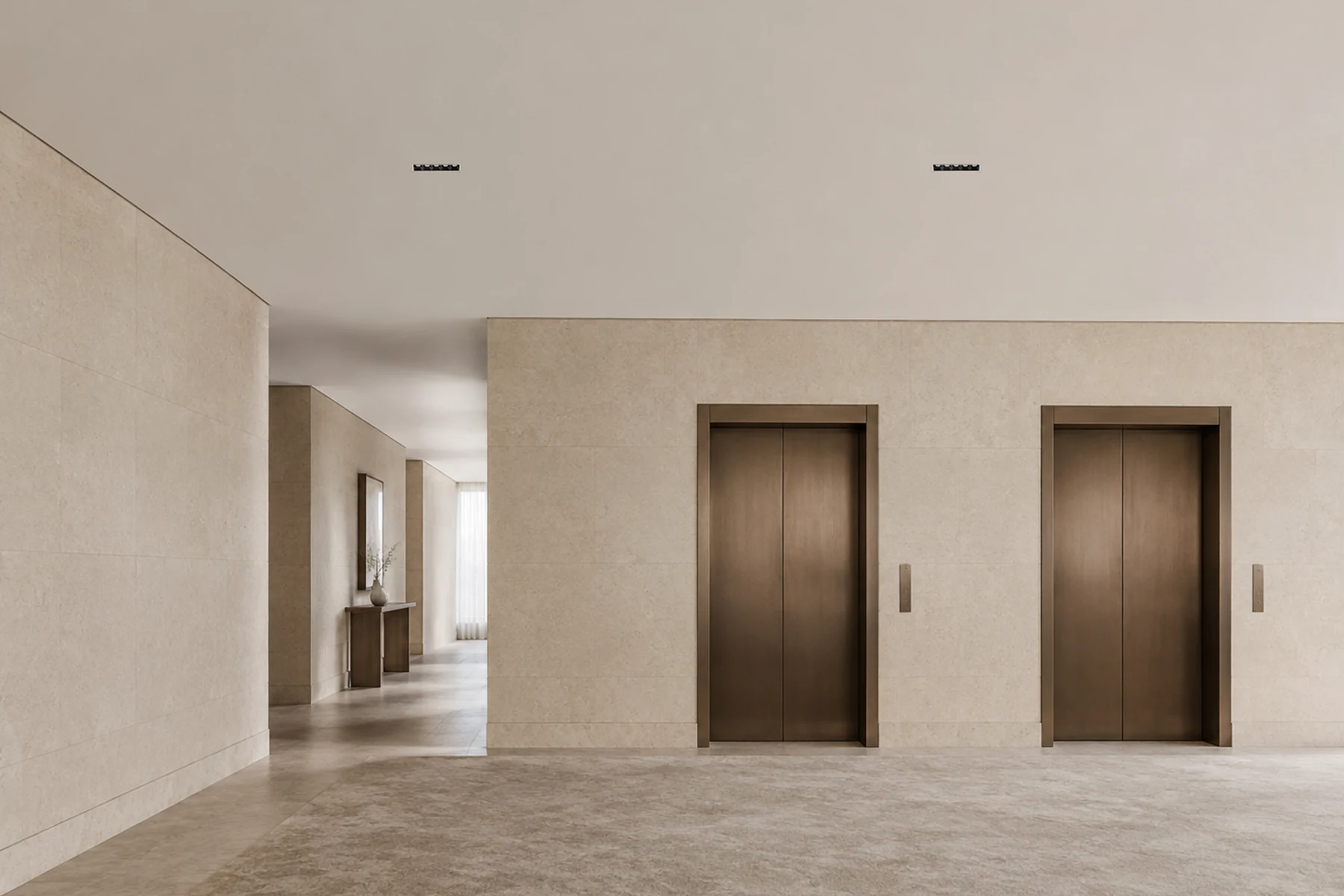 Blade linear downlights integrated into an architectural lift lobby