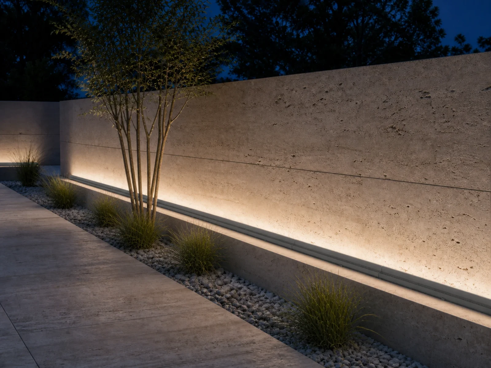 Linear wall washing integrated into an exterior landscape edge