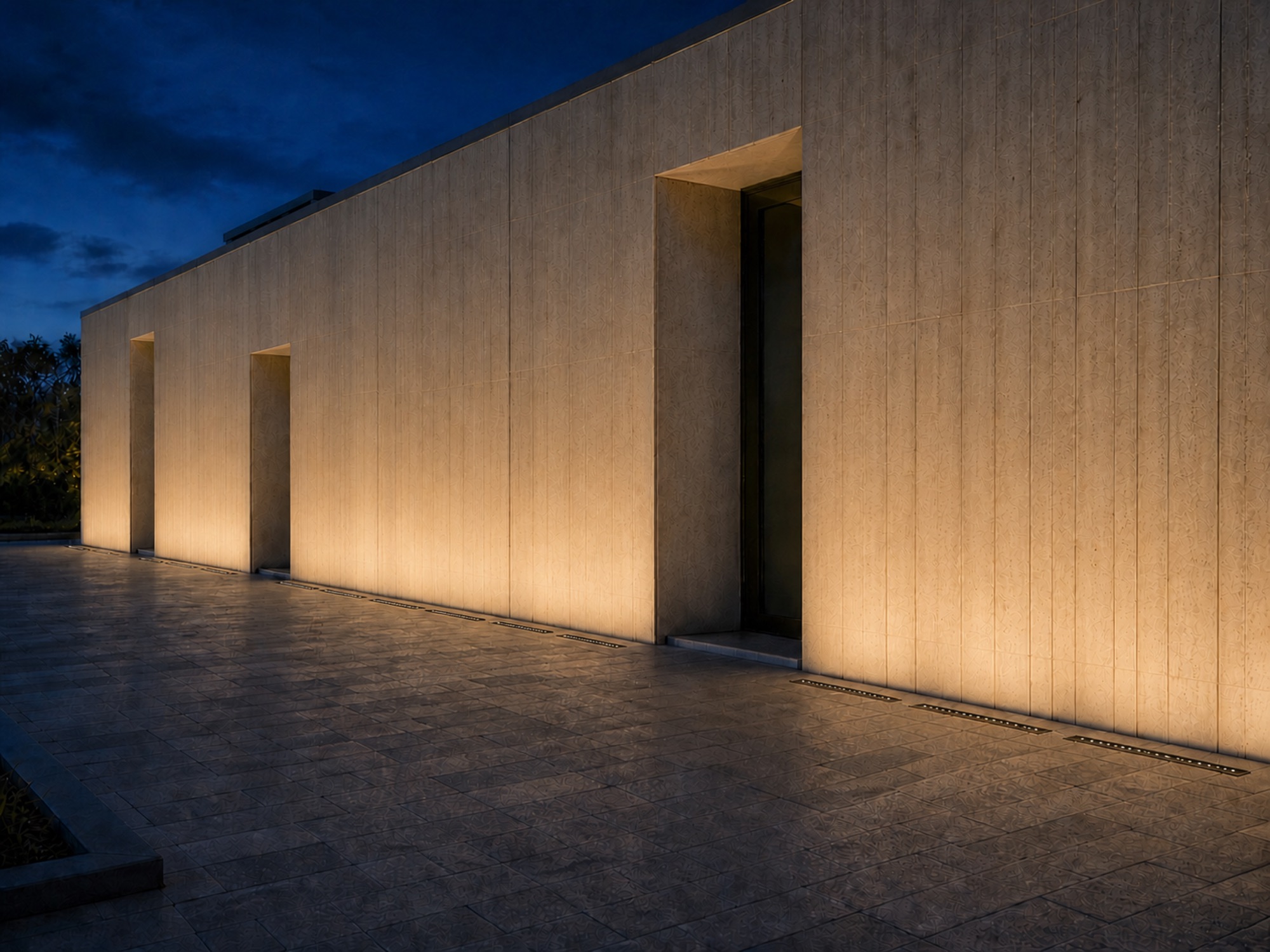 IG03 linear in-ground lighting along a long architectural wall