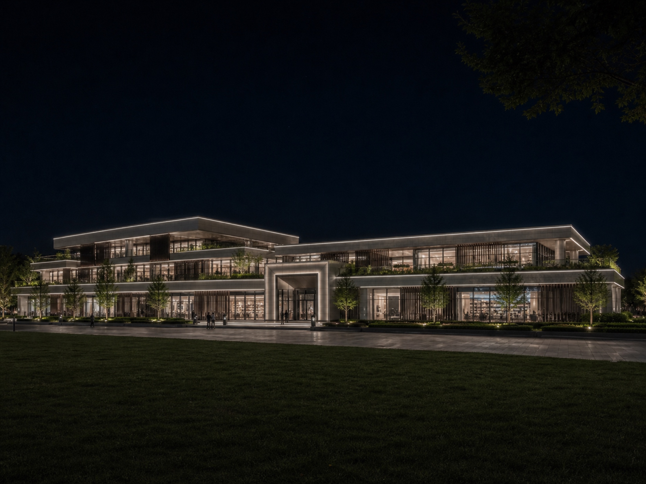 Warm continuous lighting outlining a low-rise facade
