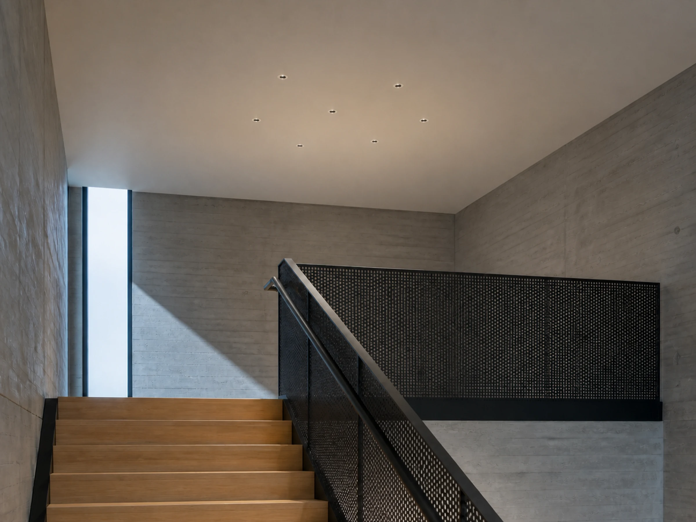 Pino recessed downlights used along a stair landing