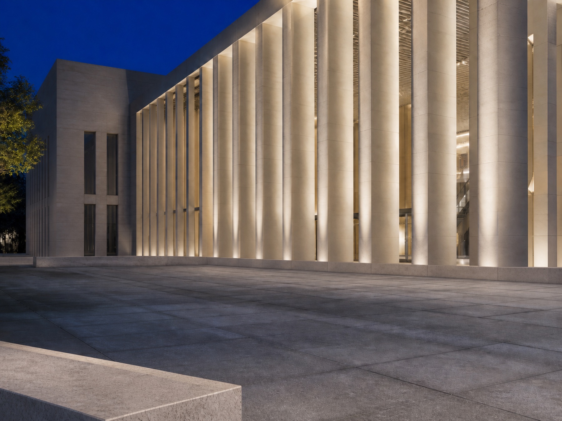 Colonnade facade illuminated with outdoor projectors