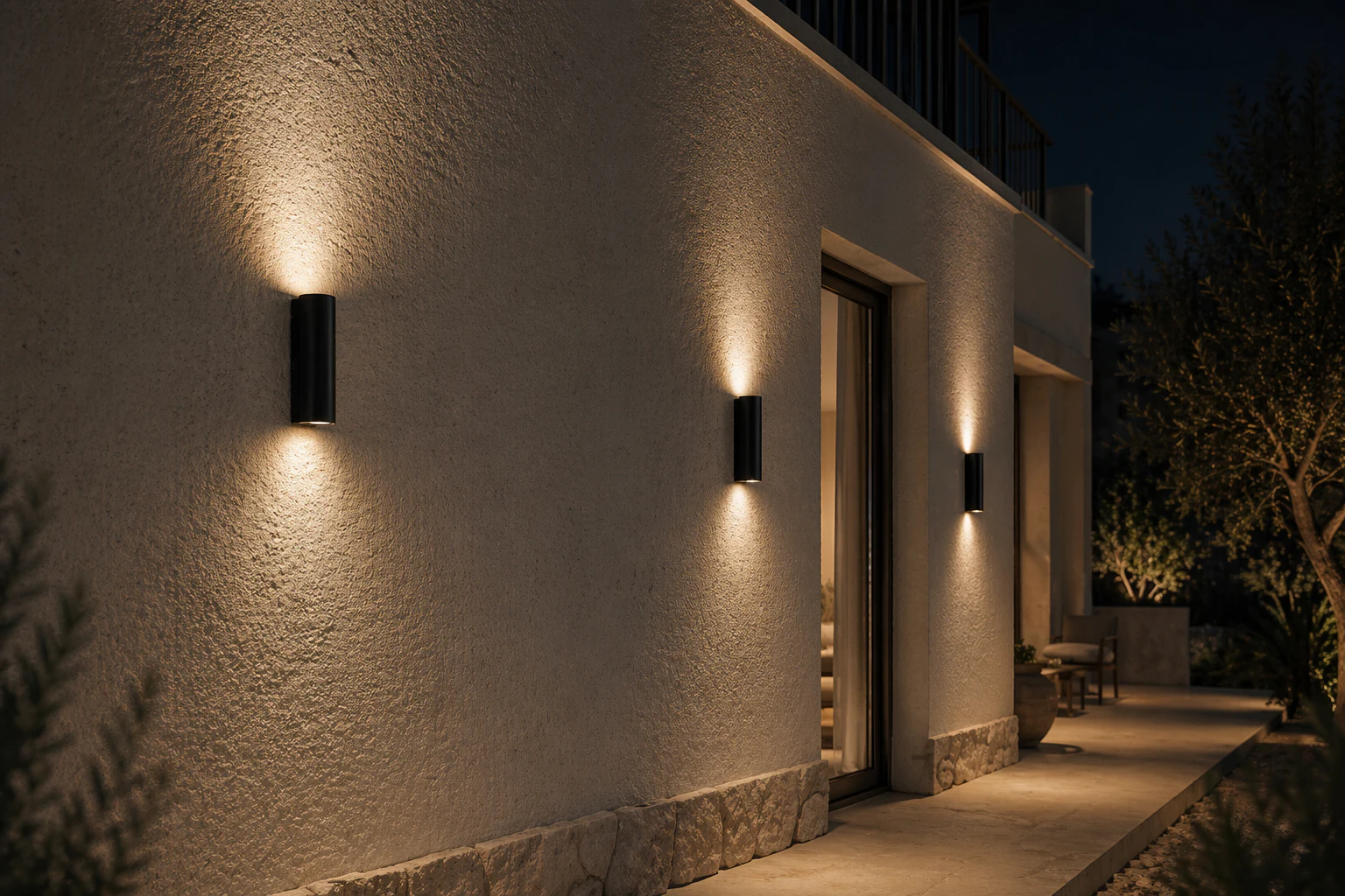 WL03D wall lights casting upward and downward light along a residential facade