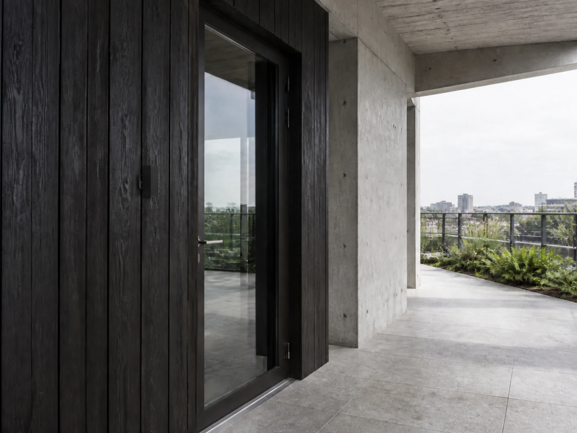 WL06D ribbed wall light integrated into a timber facade in daylight