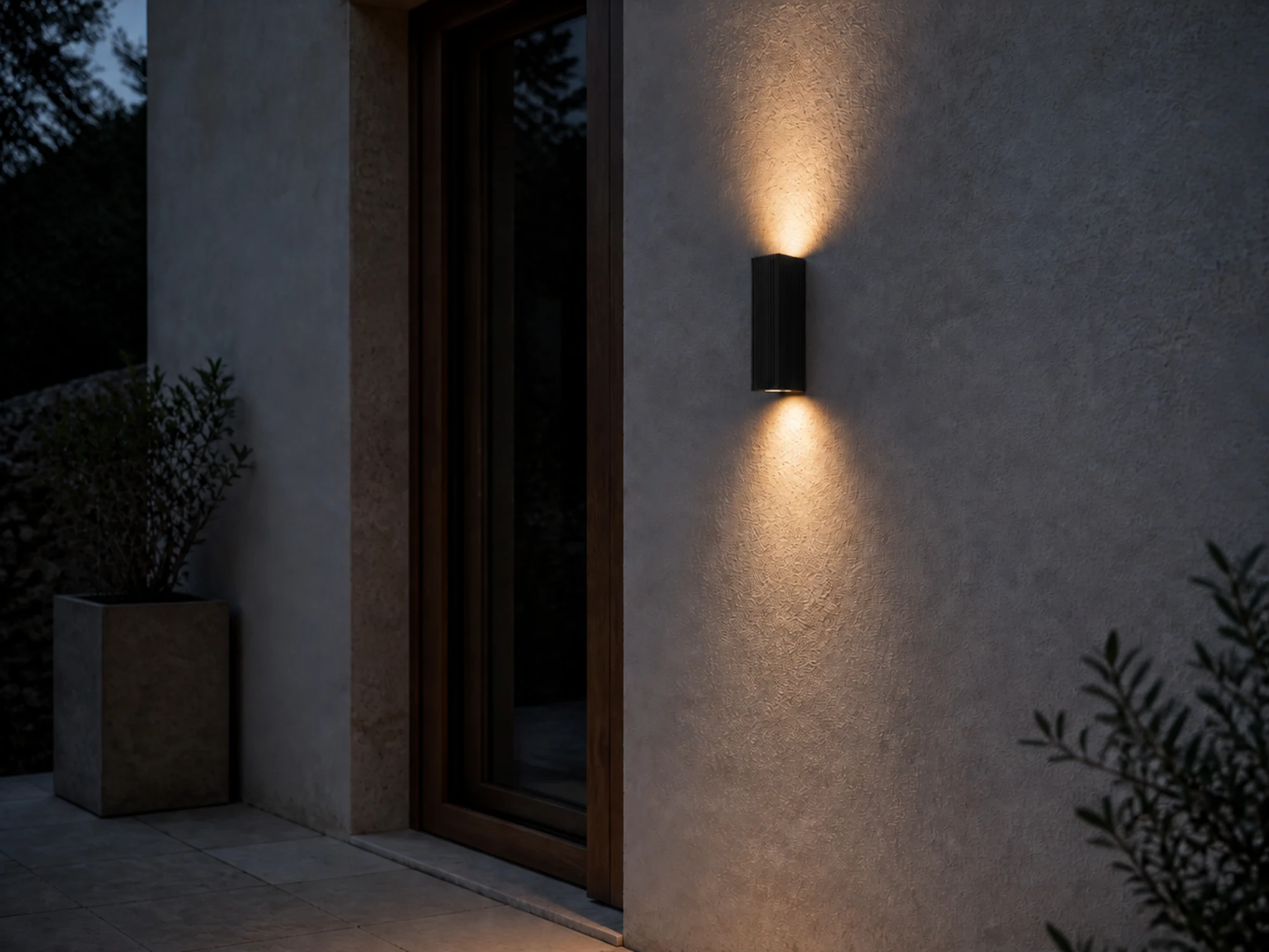 WL06D ribbed square wall light casting upward and downward light beside an entrance